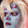 She devil makeup using a prosthetic with horns