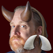 Large costume horns with costume makeup, raw foam latex horns