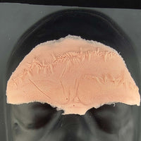 Imperfect Stitched forehead prosthetic