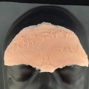 Imperfect Stitched forehead prosthetic