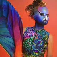 Costume bird beak body painting
