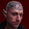 man wearing foam latex prosthetic ears