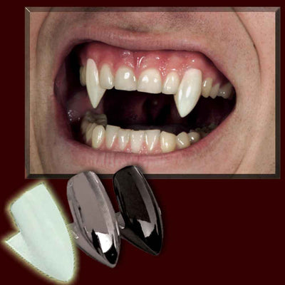 vampire fangs in silver black and glow in the dark