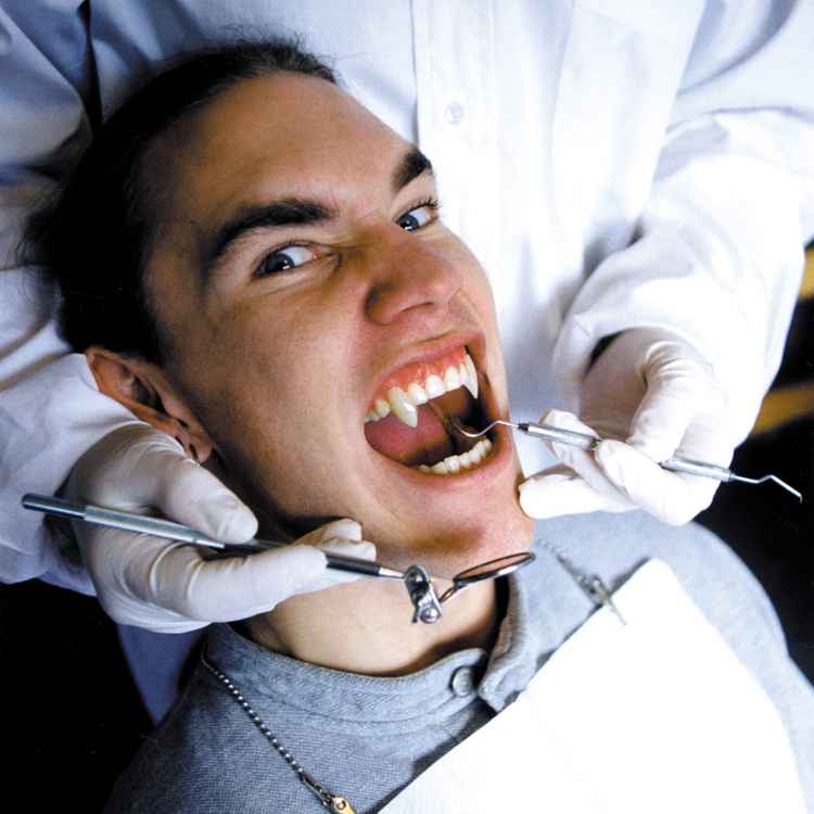 Humans With Natural Fangs